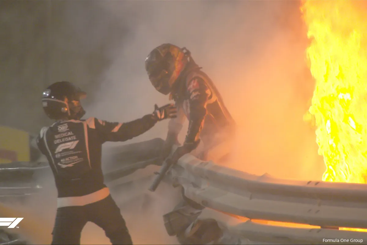 grosjean rescues himself from fire