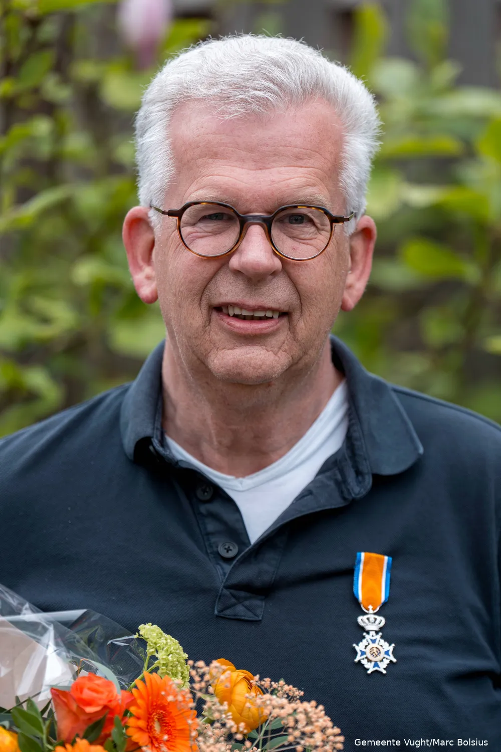 de heer C.J.A.M. van Rooij