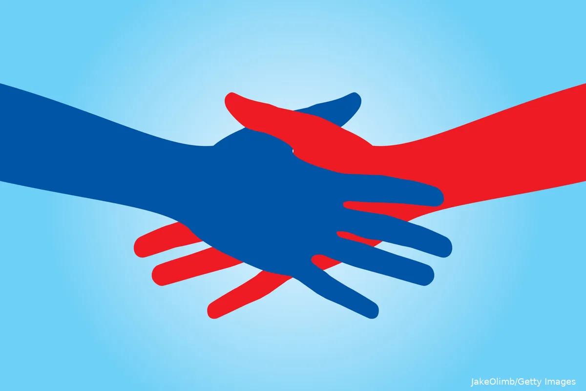 Red and blue hands coming together