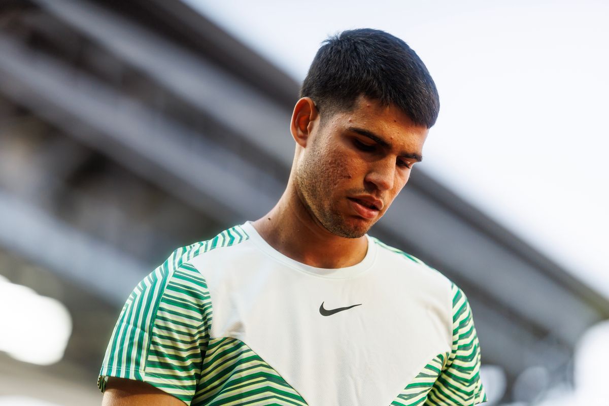 WATCH: Alcaraz Forfeits Game To Djokovic After Massive Cramps At Roland Garros