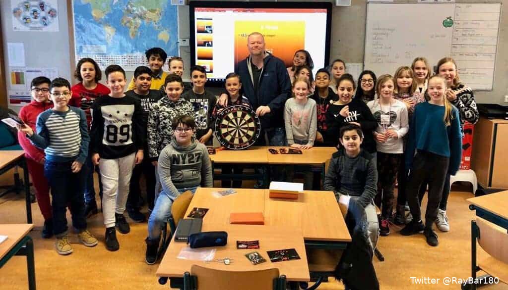 VIDEO Van Barneveld brings surprise gift for fan during presentation