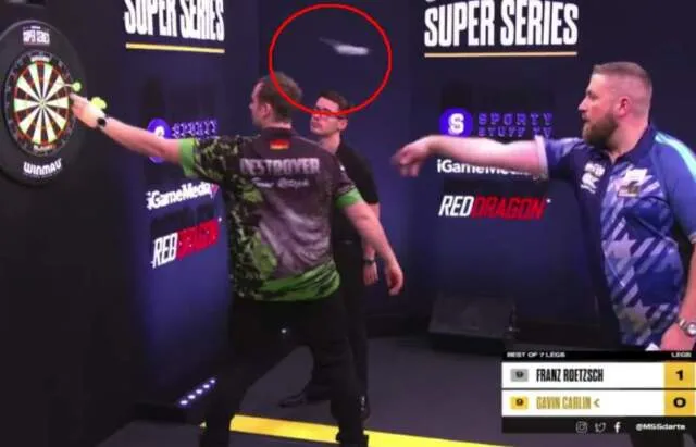 VIDEO: Carlin nearly pins Roetzsch to dart board in very near miss at ...