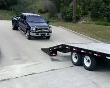 Ford op trailer laten rollen gaat niet zo goed