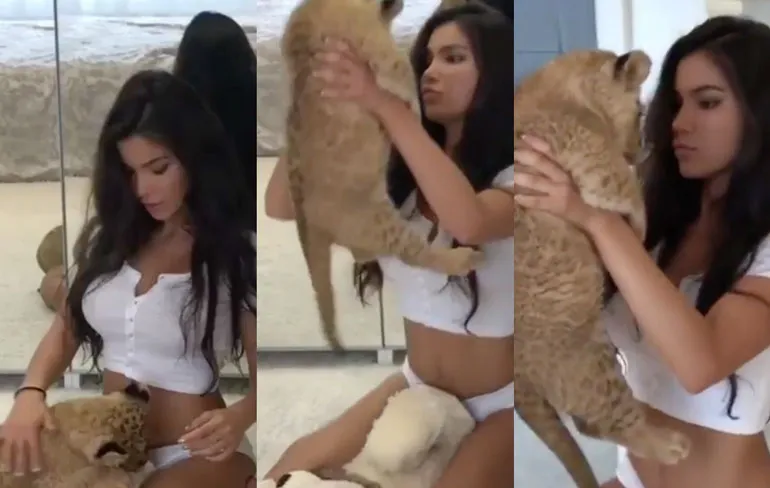 Simba moet even wat kwijt tijdens shoot met model