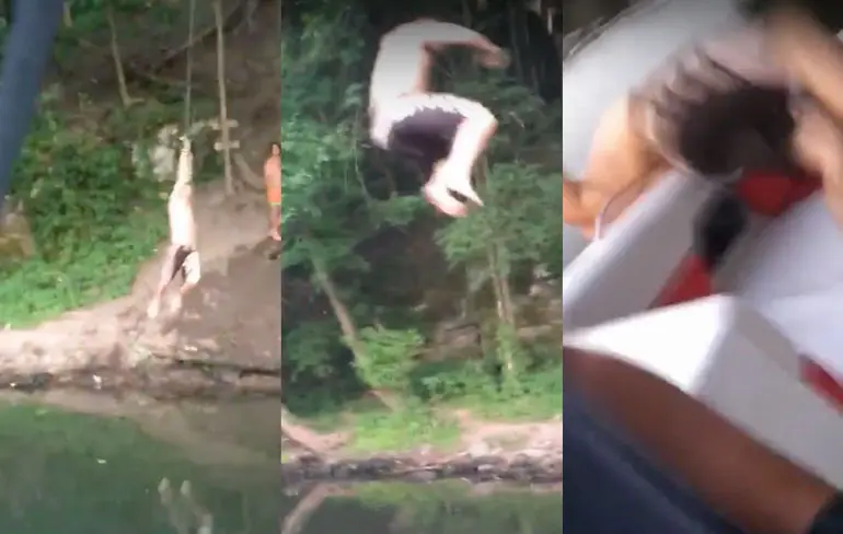 Rope swing dude klapt met rug tegen boot