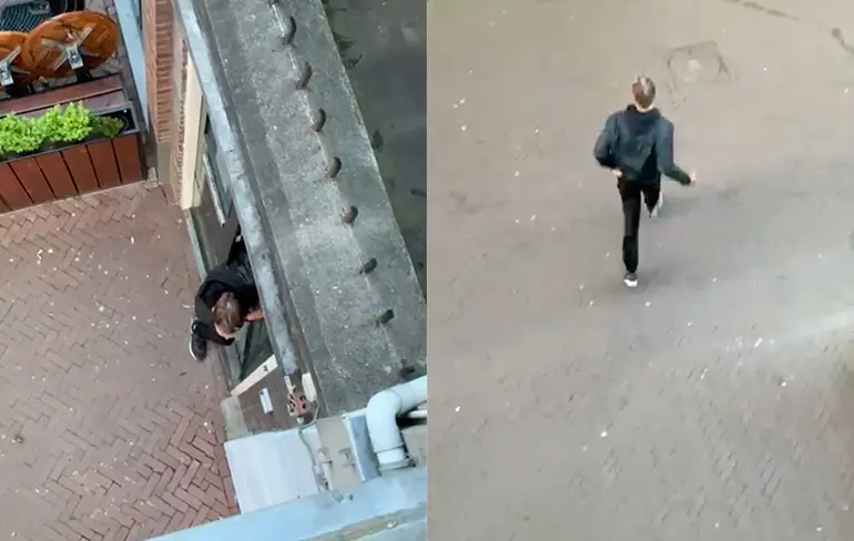 Andere hoek man in Leeuwarden springt door ruit