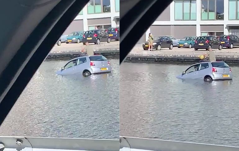 Auto belandt in water in Den Haag, bestuurder neemt ballonnetje lachgas op dak