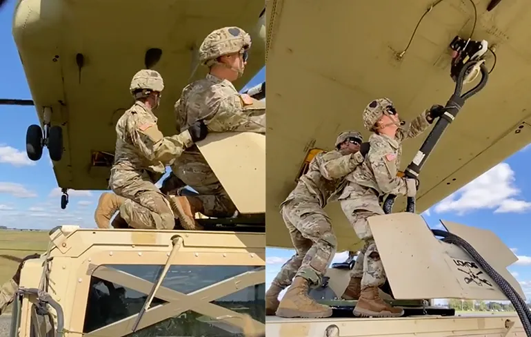 Awesome beelden van cargo ophalen door een Chinook