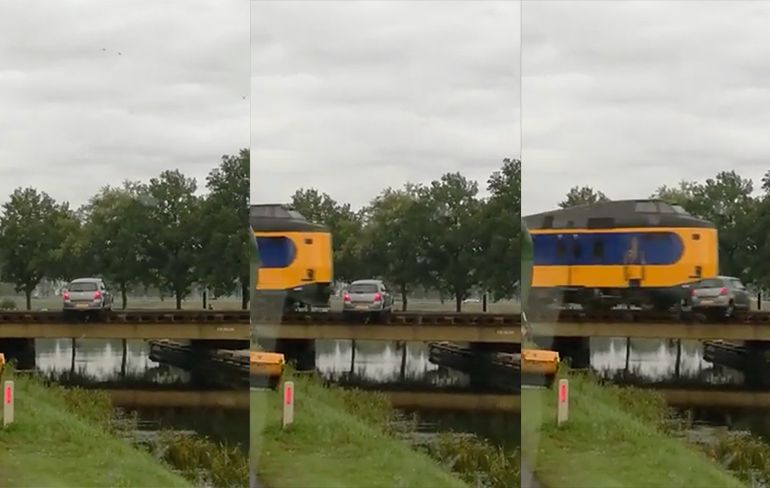 Beelden opgedoken trein ramt auto midden op spoorbrug in Meppel