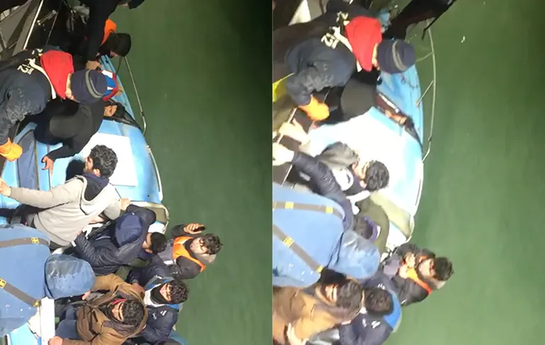 Beelden Urker vissers redden 19 migranten voor kust van Duinkerken