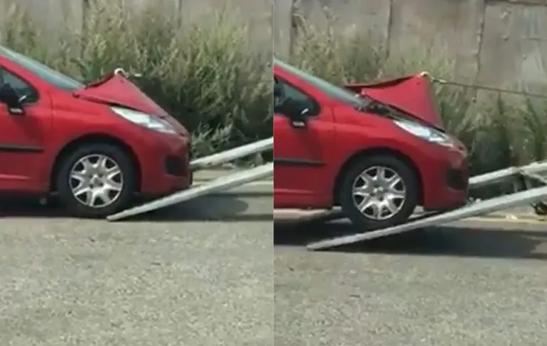 Beunhaas trekt auto aan motorkap op oplegger