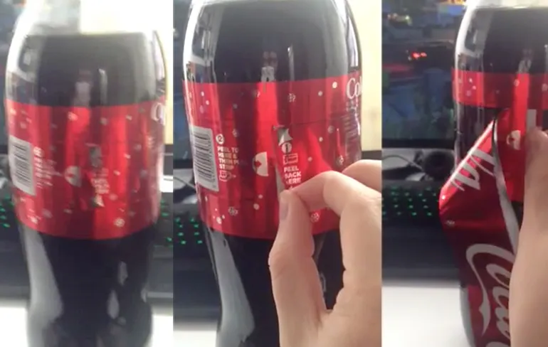 Coca Cola heeft flessen met geniale kerststrik!
