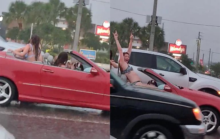 Dames in Florida vieren feestje in cabrio terwijl het buiten regent