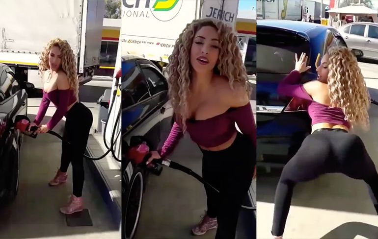 Dansende dame vermaakt zich wel bij benzinestation