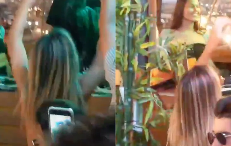 DJ heeft mooi uitzicht op schoonheid die voor hem staat