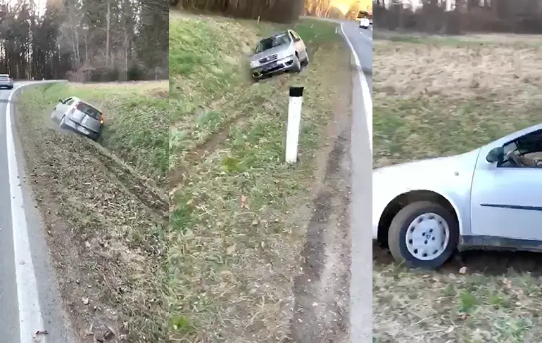Duitser heeft wat moeite om met auto uit greppel te komen