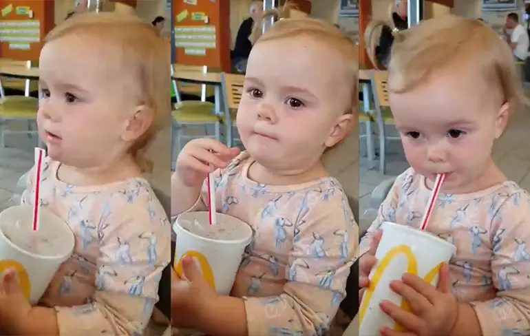 Evie's eerste slokje cola