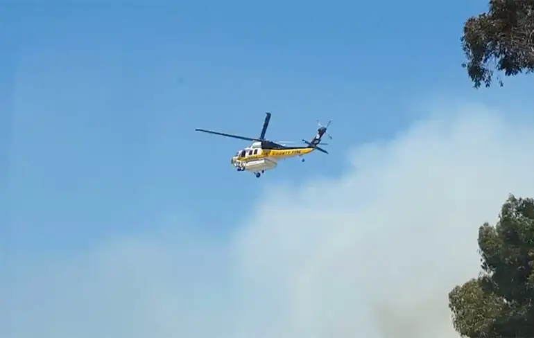Gasten in auto in Los Angeles zien voor het eerst een helikopter?