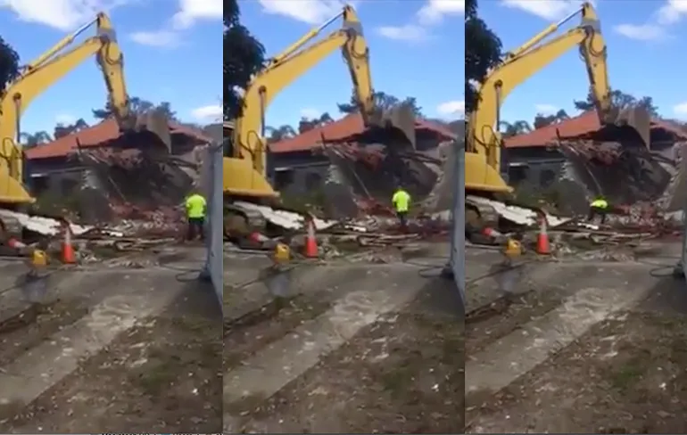 Graafmachine laat wat vallen, maar man heeft Engeltje op zijn schouders...