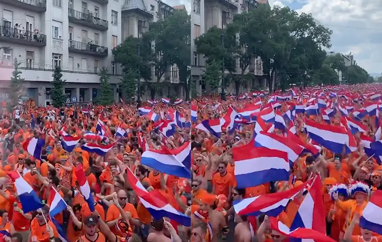 Hele vette beelden van een Oranje golf in de straten van Boedapest