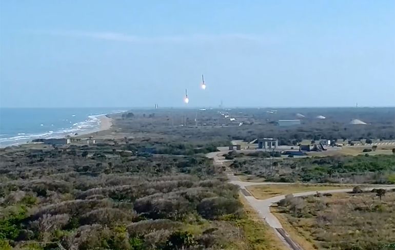 Het moment dat de twee Falcon Heavy boosters landen was awesome!