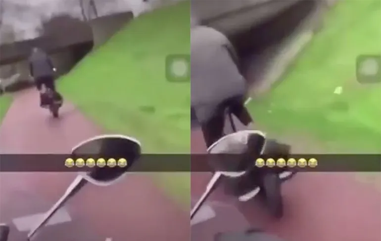 Idioten op scooter duwen oudere man van fiets af