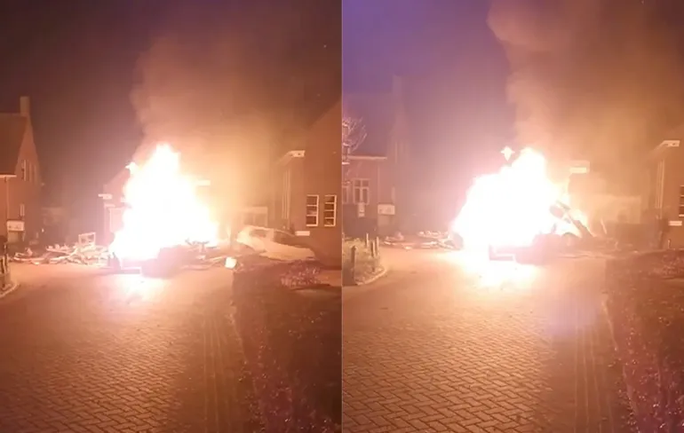 In dorp Boerakker zijn ze echt gek: Auto parkeren in een groot vreugdevuur