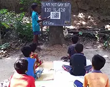Kids in India: I'm not gay, but $20 is $20