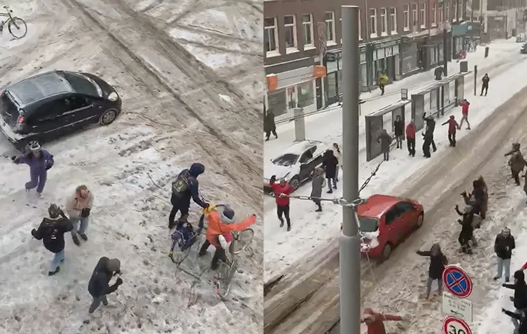 Leuke sneeuwpret beelden uit Amsterdam