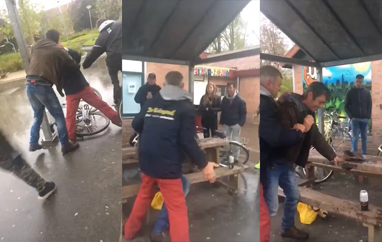 Man in Telegraaf jas brengt andere man wat respect bij