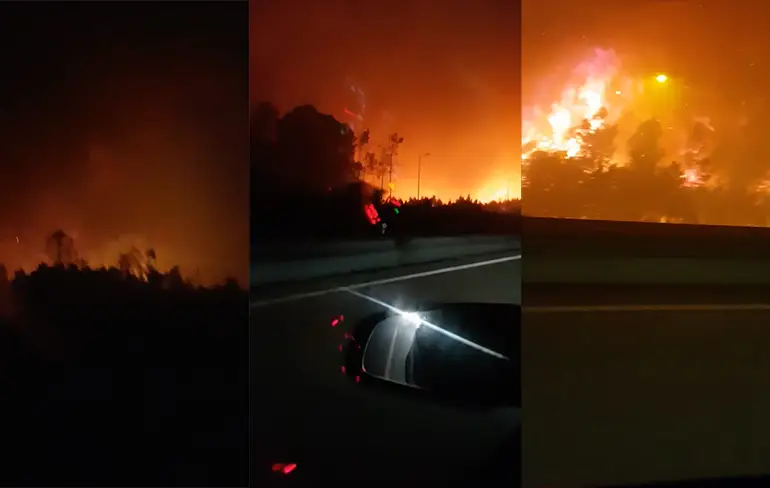Man maakt spannend ritje tussen vlammenzee in Portugal