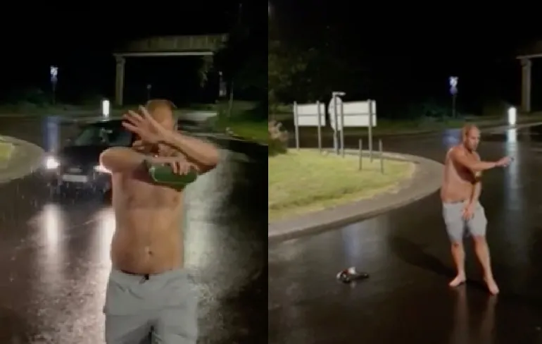 Man op rotonde maakt zijn eigen feestje