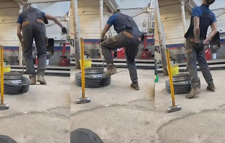 Man probeert velg uit band te drukken, krijgt heel veel pijn