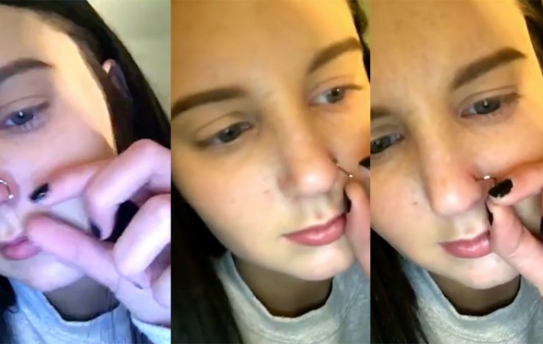 Meisje haalt piercing uit haar neus... WTF!