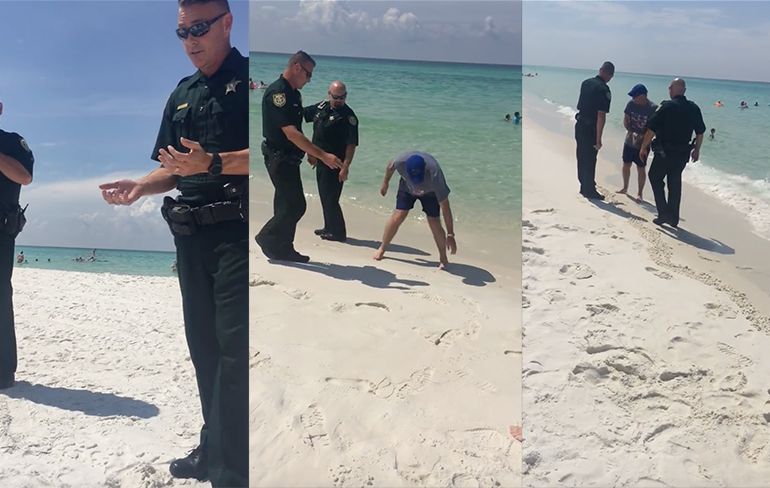 Mensen in Florida hebben niets te doen: Lijn trekken in het zand