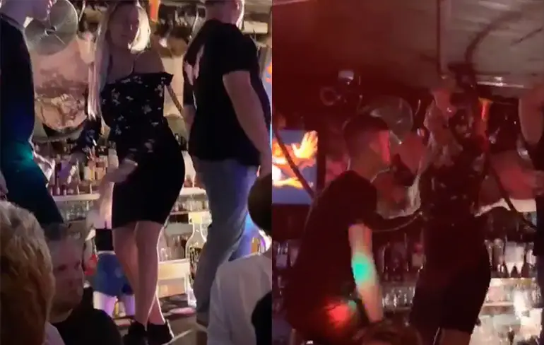 Mooiboy probeert indruk te maken op bardame, maar faalt