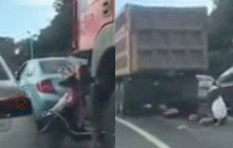 Motorrijder wordt overreden door vrachtwagen, maar heeft toch geluk