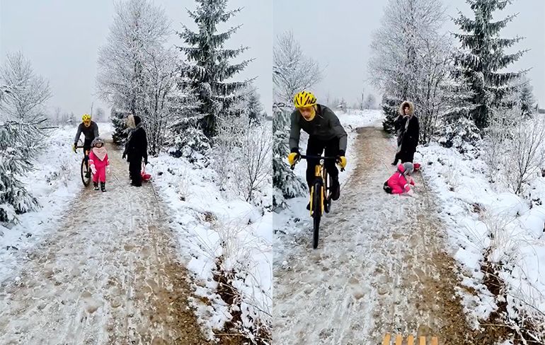 Mountainbiker geeft 5-jarig meisje een knietje, zodat hij door kan fietsen