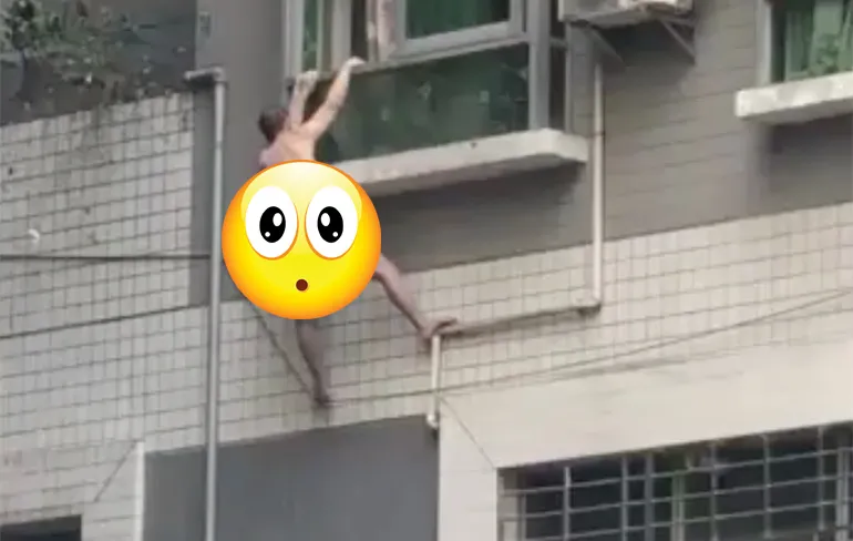 Naakte man gaat uit raam hangen en valt naar beneden