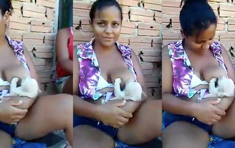 Nee joh, is heel normaal: Vrouw geeft borstvoeding aan puppy
