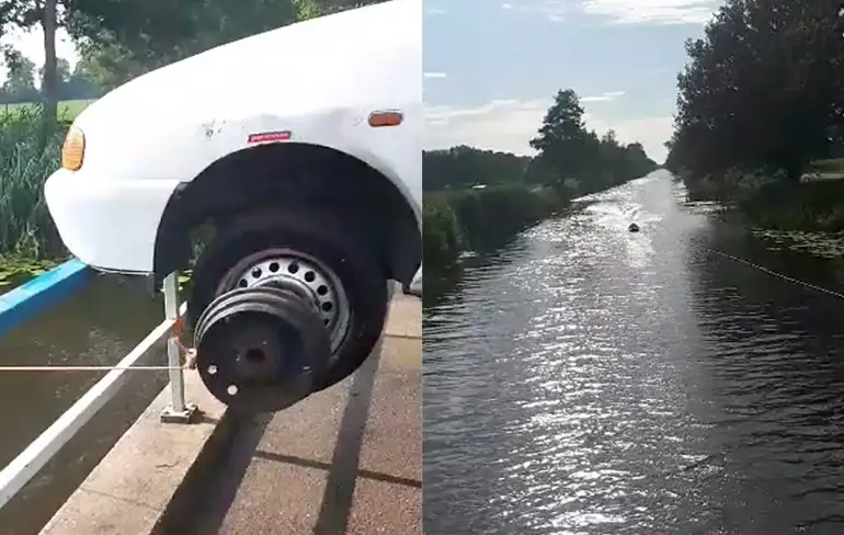 Ondertussen in dorpje Daarle: Auto op de brug en gaan