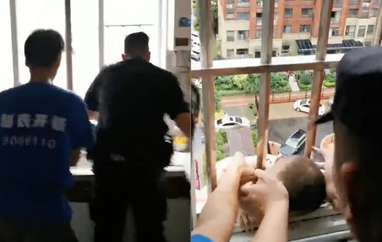 Ouders letten even niet op, kind hangt uit raam