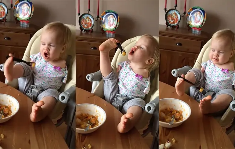 Respect: Klein meisje zonder armen eet met haar voeten
