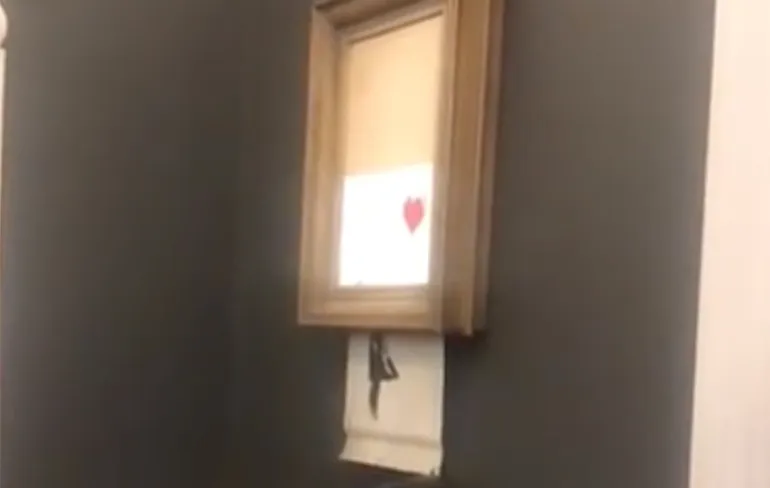 Schilderij Banksy vernietigde zichzelf na afhamering op 1,2 miljoen euro
