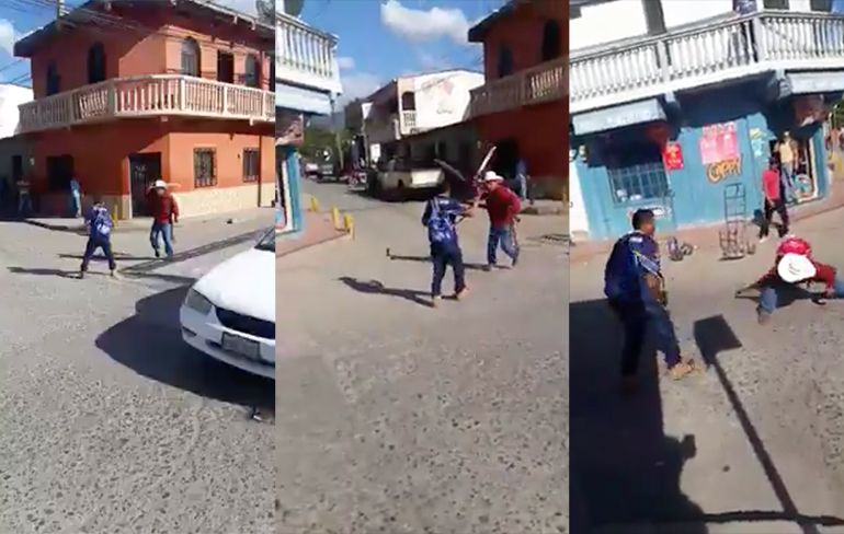 Twee inwoners van Comayagua in Hunduras houden gezellig machete gevecht