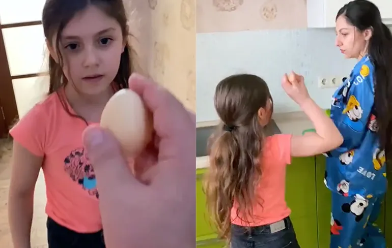 Vader van het jaar laat dochter een eitje tikken