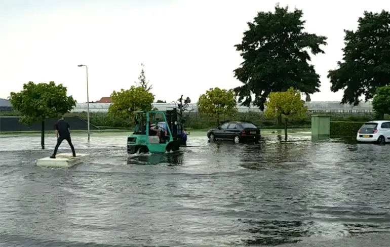 Veel regen gevallen in Boskoop: Niet iedereen vond dat erg