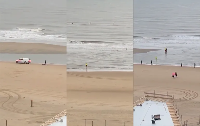 Vluchtende man rent water in bij Bloemendaal aan Zee