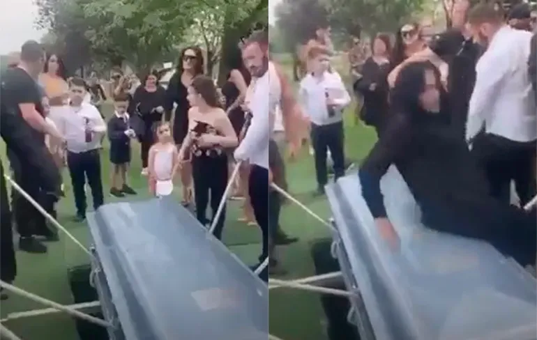 Vrouw doet even lekker gek op begrafenis en rolt over kist heen