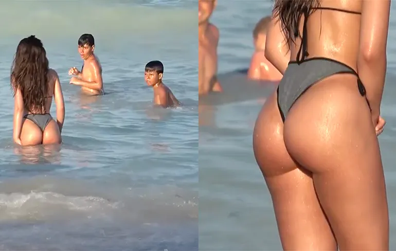 Zwijmel nog eens weg bij het billenmeisje op het strand